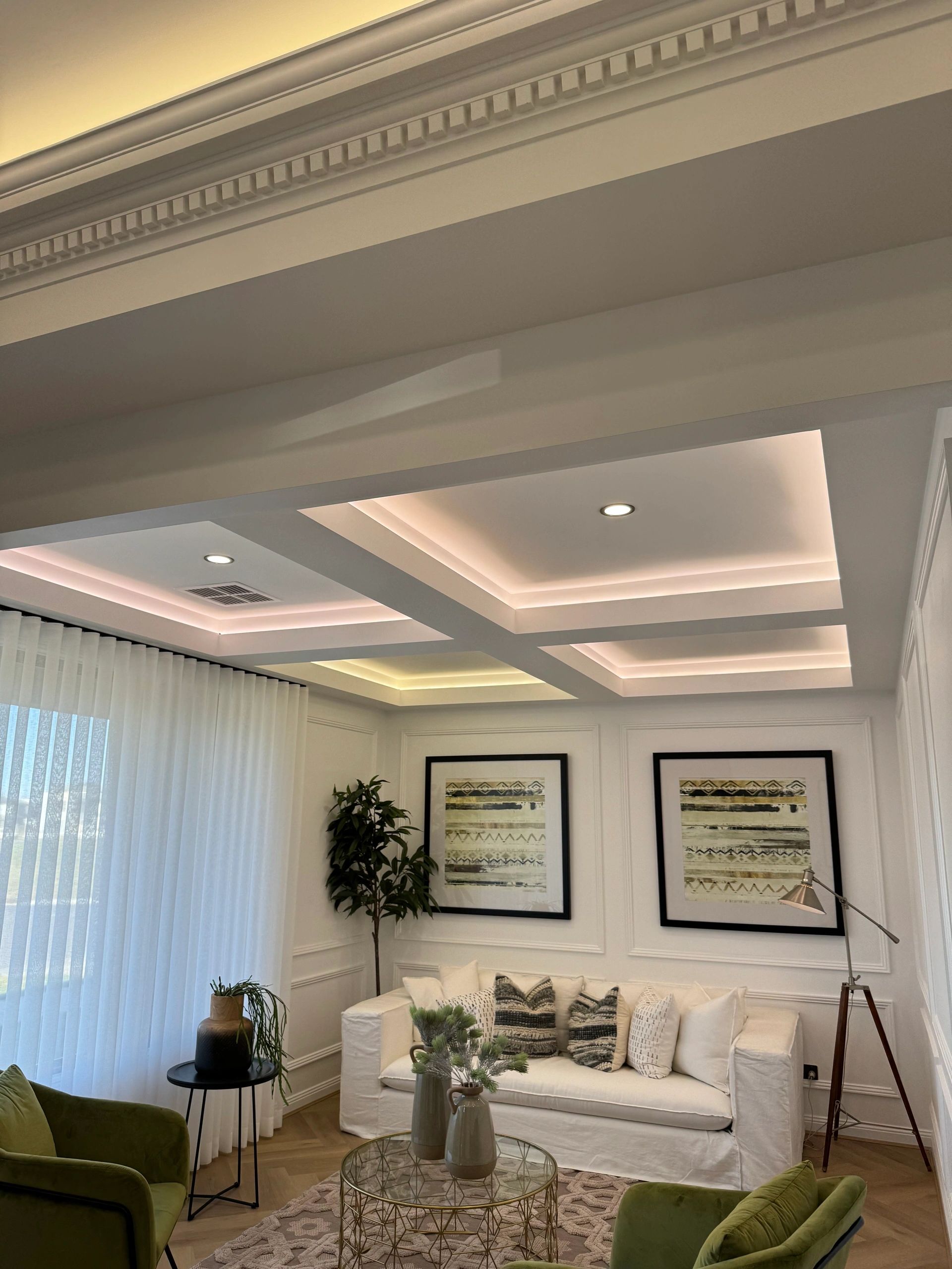 Modern living room with coffered ceiling recessed lighting